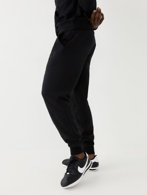 black hoodie and sweatpants