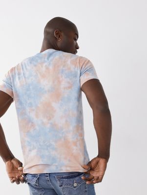 can you tie dye a shirt with a logo on it