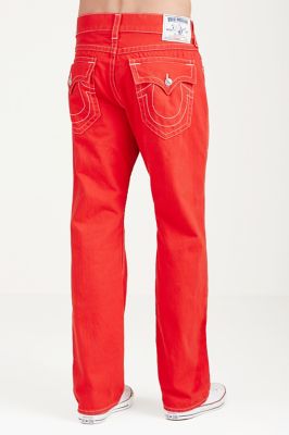 white true religion jeans with red stitching