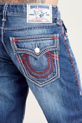 white true religion jeans with red stitching