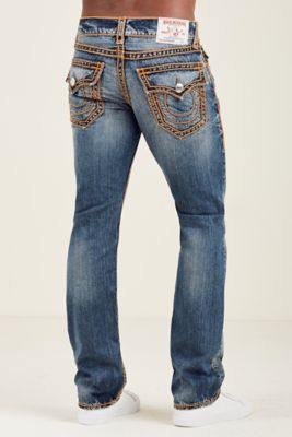 orange true religion jeans