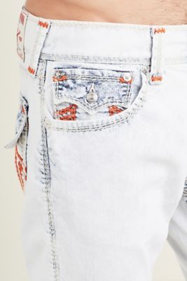 orange true religion jeans