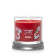burning cherries on snow signature small tumbler candle on lid as tray image number 1