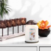 coconut beach large classic candles with illuma lid on tray and multi tea light holder on desk image number 4