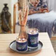 two signature jar candles in lakefront lodge on living room table image number 4