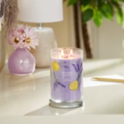 lemon lavender signature large tumbler candle on table in living room image number 3