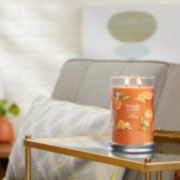 honey clementine signature large tumbler candle lit on side table image number 2