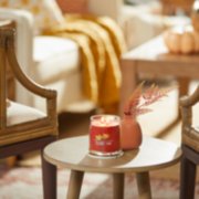 autumn leaves signature medium jar candle on table image number 4