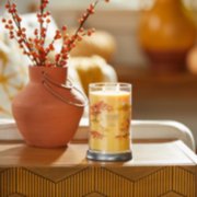 sunlit autumn signature large tumbler candle on table image number 4