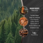 photo collage illustrating woodwick warm woods trilogy fragrances of fireside, redwood, and sandalwood clove image number 2