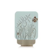 scentplug diffuser with embossed flower design