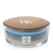 tropical oasis sand and driftwood at the beach ellipse trilogy candle