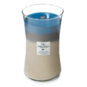 nautical escape trilogy tropical oasis sand and driftwood at the beach large hourglass trilogy candle image number 1