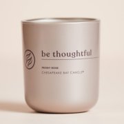 chesapeake bay candle intentions collection be thoughtful peony rose medium two wick candle in a pastel pink backdrop