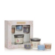 gift set with sakura blossom festival signature small tumbler candle and sakura blossom festival, amber and sandalwood, and sweet plum sake yankee candle minis, both inside and outside of packaging image number 2