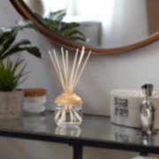 reed diffusers on glass table image number 5