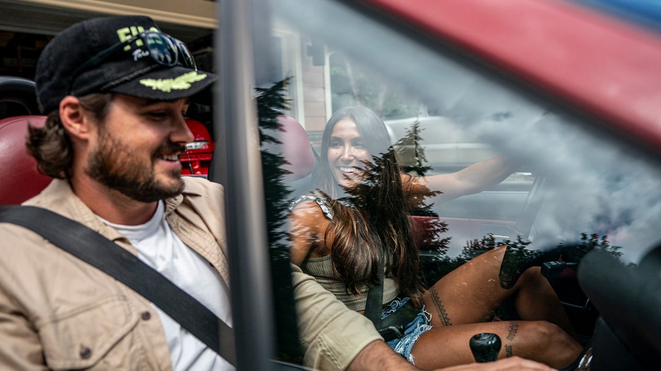 couple smiling in car