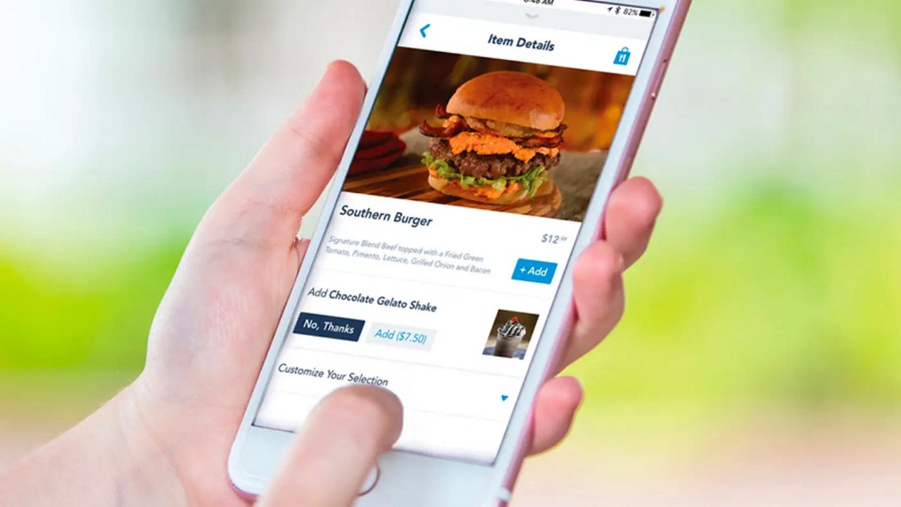 hands using mobile app to order food