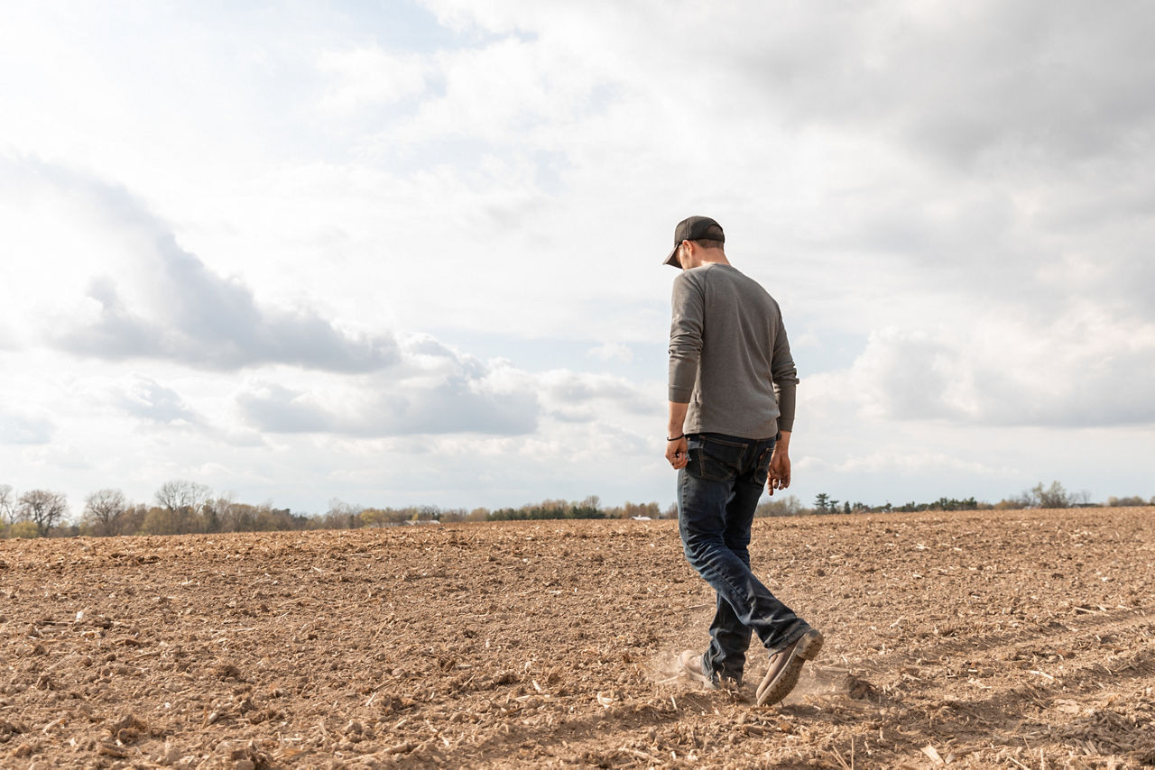 man on cultivated field