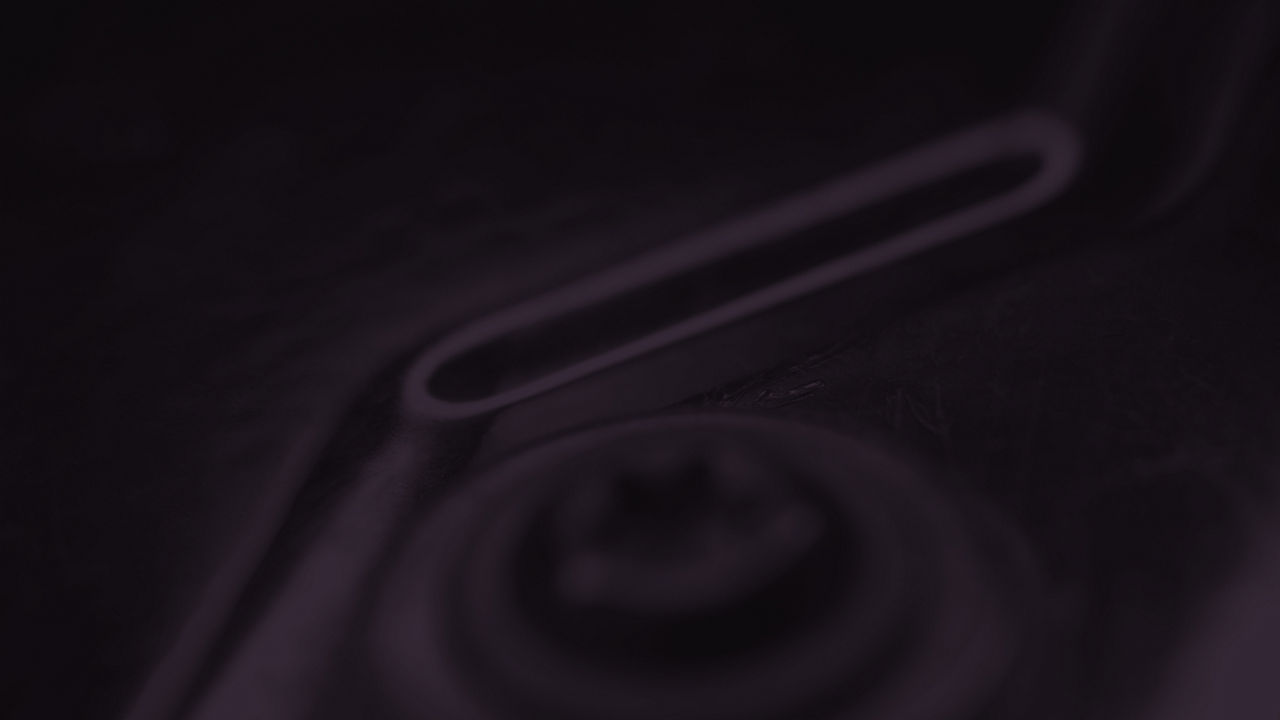 A selection of filters faintly showing on a black background