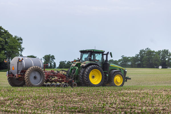 A fertilizer applicator and tractor