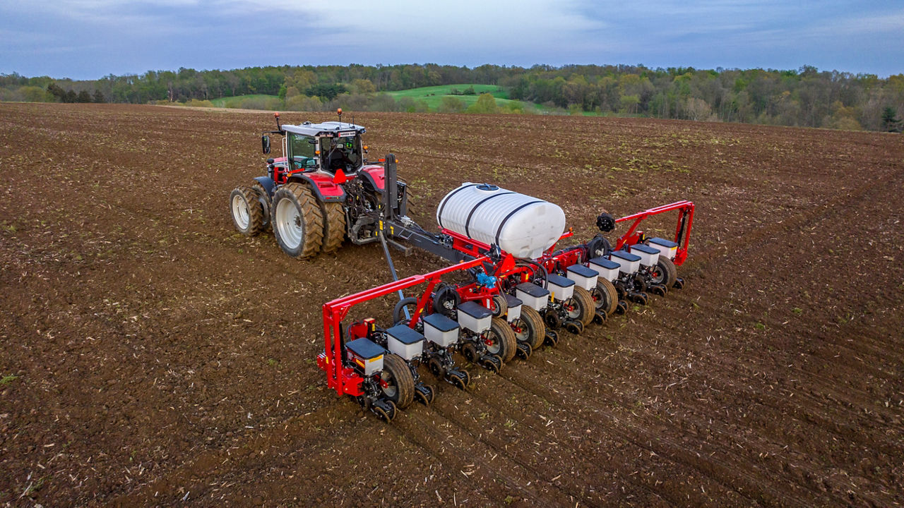 Massey Ferguson 8S pulling a MFVF-12-30 Planter