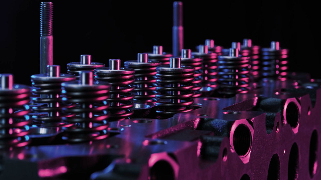 A series of springs on top of an engine block