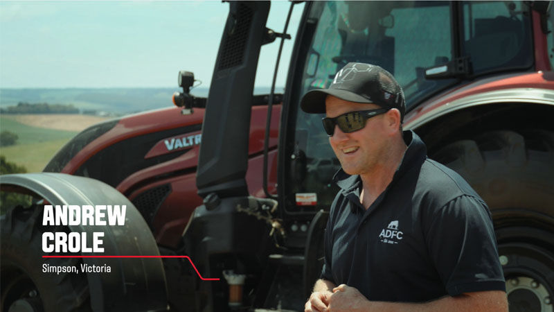 A Valtra customer from Victoria, Australia stands in front of his Valtra tractor