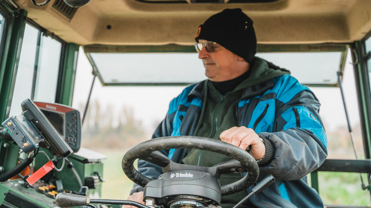 Farmer using the PTx Trimble Autopilot system