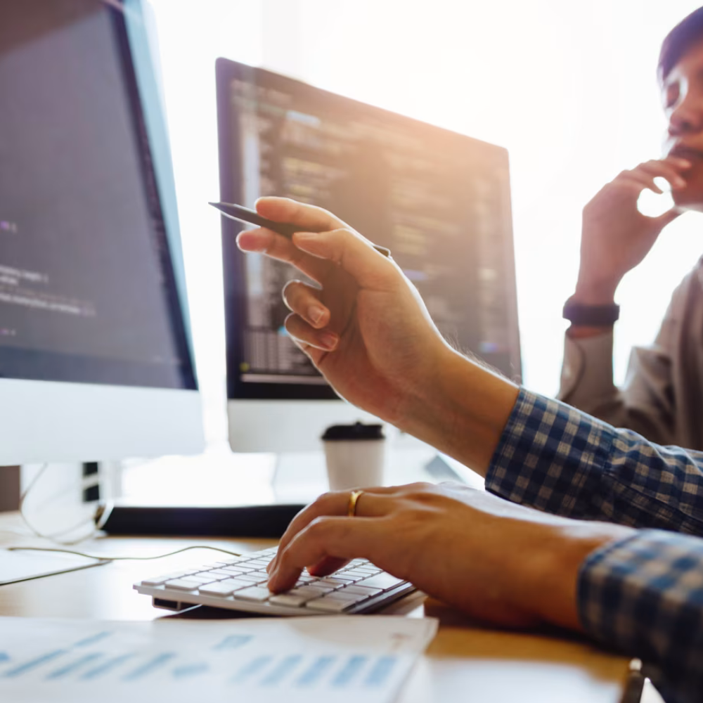 Coworkers in office reviewing data