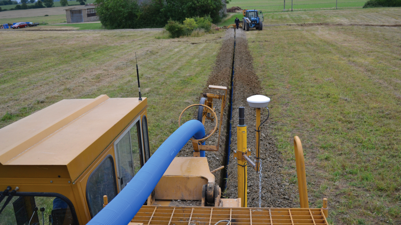 Farmer using the PTx Trimble EZ-Steer system