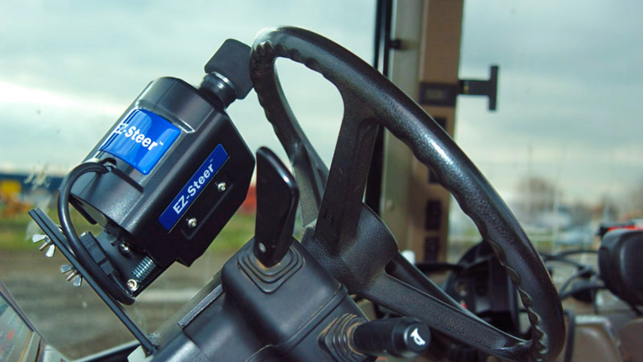Farmer using the PTx Trimble EZ-Steer system