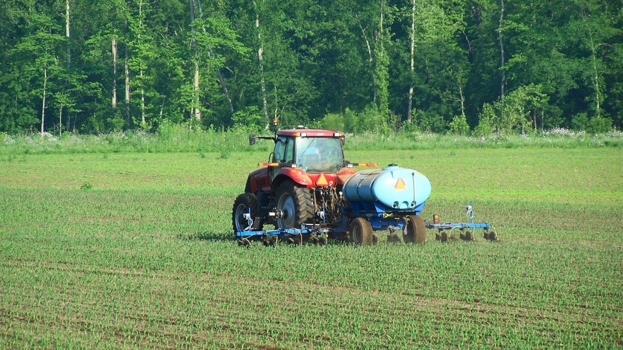 A tractor using the Field-IQ crop input control system