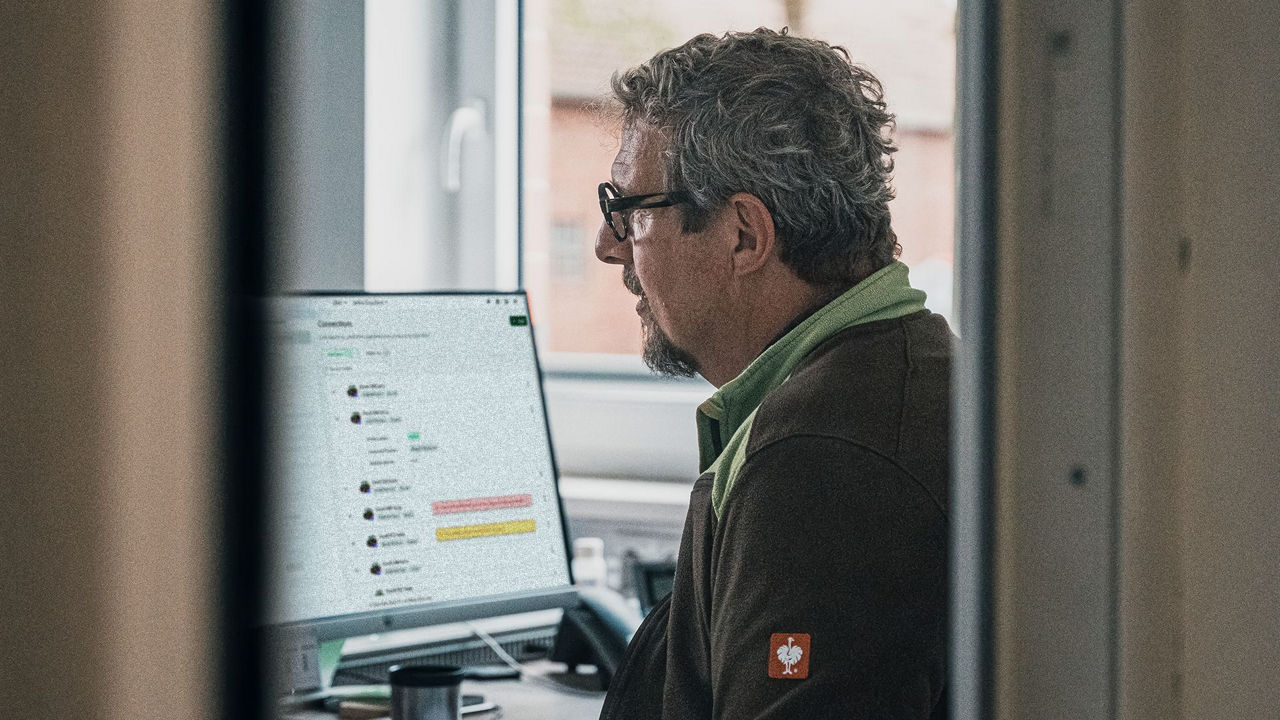 Man in office reviewing data