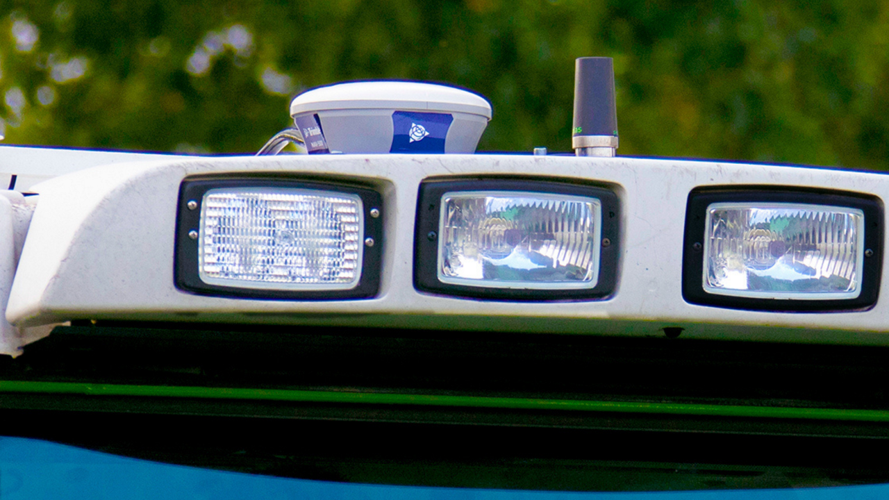 The PTx Trimble NAV-500 guidance controller on the roof of a tractor.