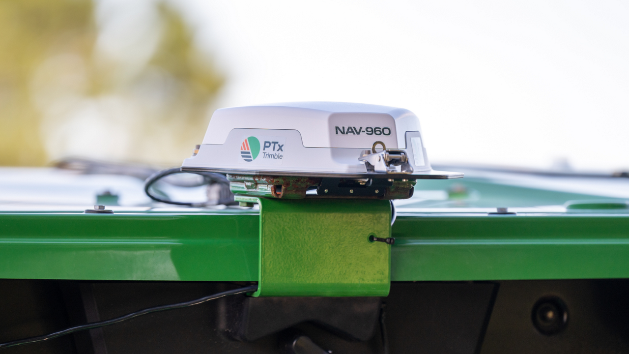The PTx Trimble NAV-960 guidance controller on the roof of a tractor