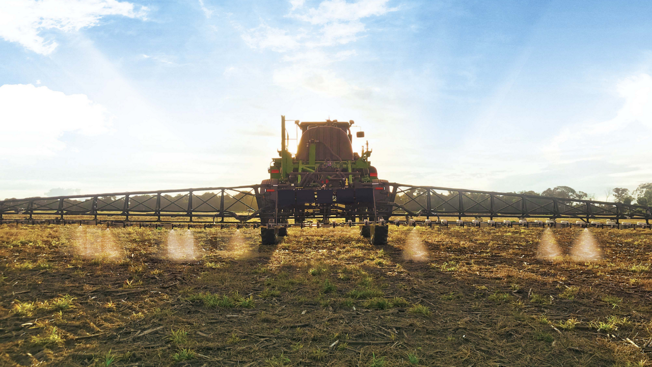 The PTx Trimble WeedSeeker 2 system on a sprayer in low light.