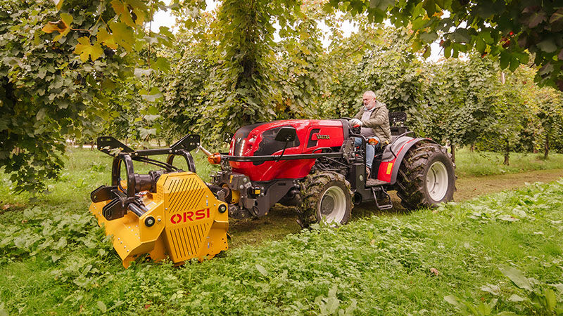 The Valtra F Series standard low model working in a fruit farm