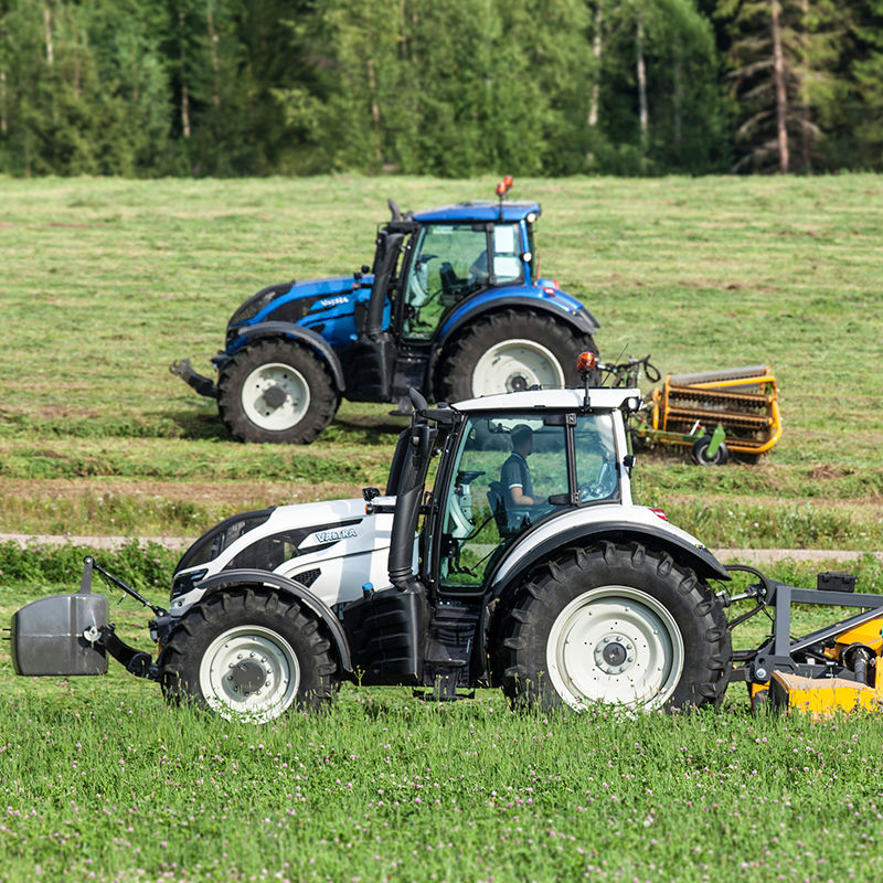 valtra unlimited custom tractor at fiel working with autoguide