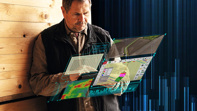 A farmer looking at an iPad with holographic screens superimposed