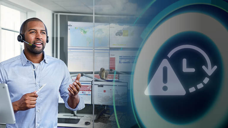 A technician speaking into a headset with an engine warning graphic superimposed