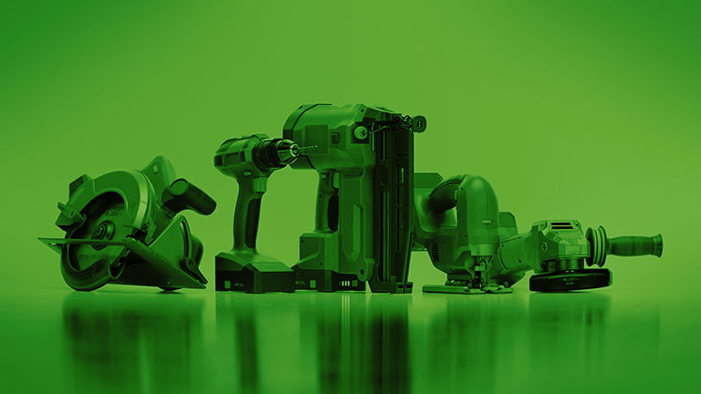 A picture of various power tools on a bright green background