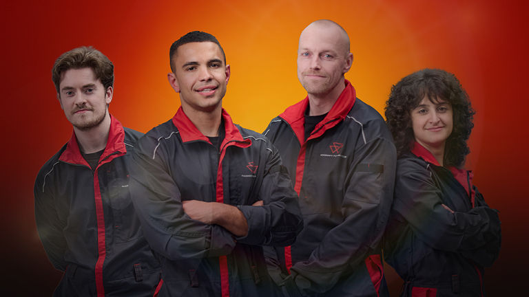 Three men and one woman stood looking into the camera looking competent and determind