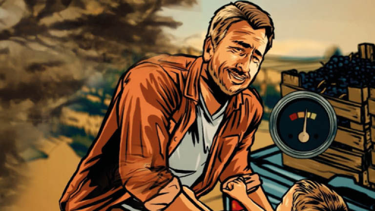 Man working with grapes in vineyard setting