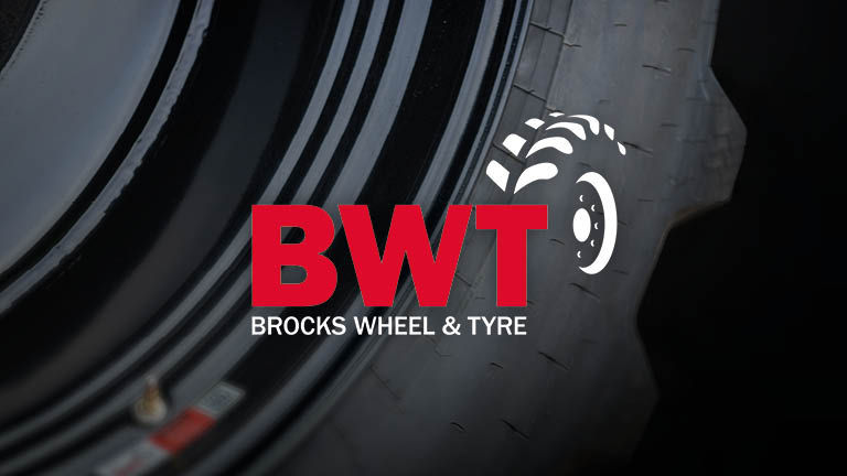 The BWT logo superimposed on a closeup picture of a tyre