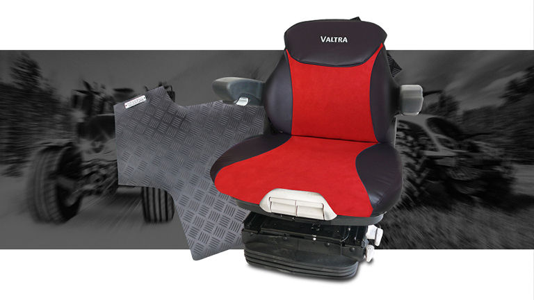 A seat and some floor mats superimposed on a grey picture of tractors