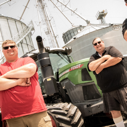 two men with a tractor