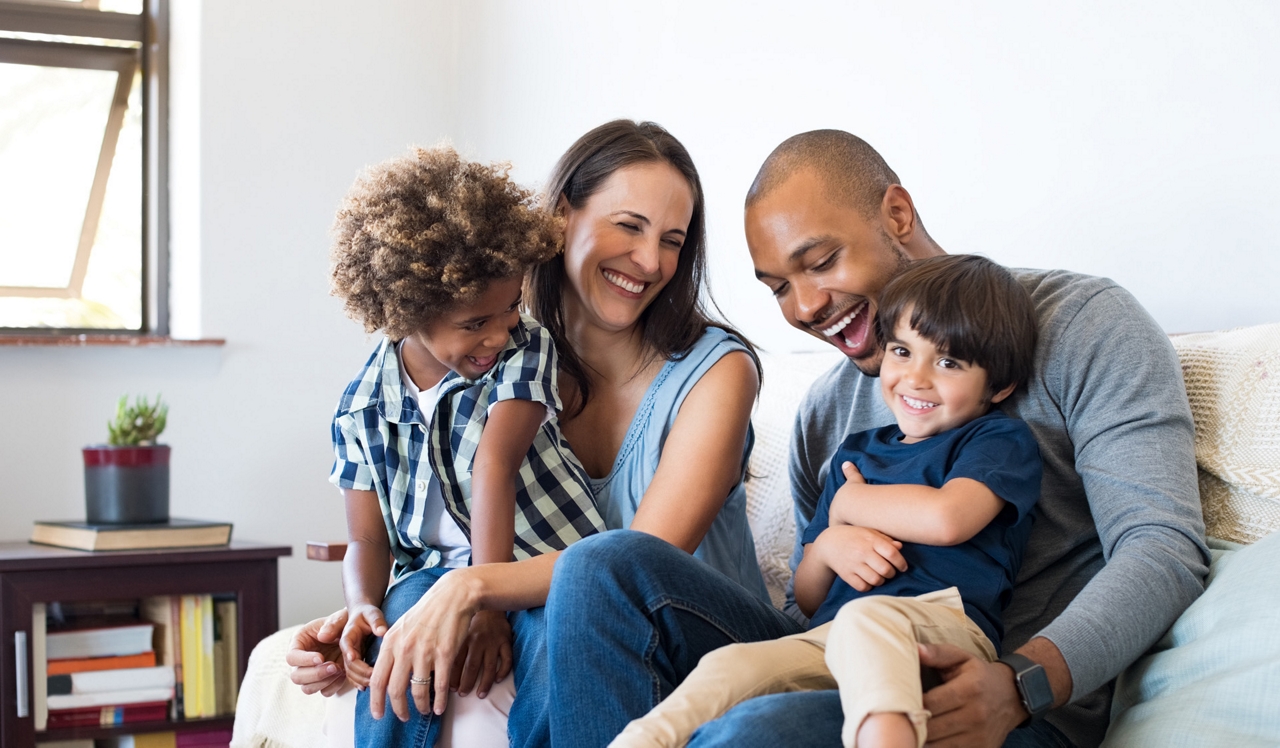 Oak Shore Homes - Family on a couch
