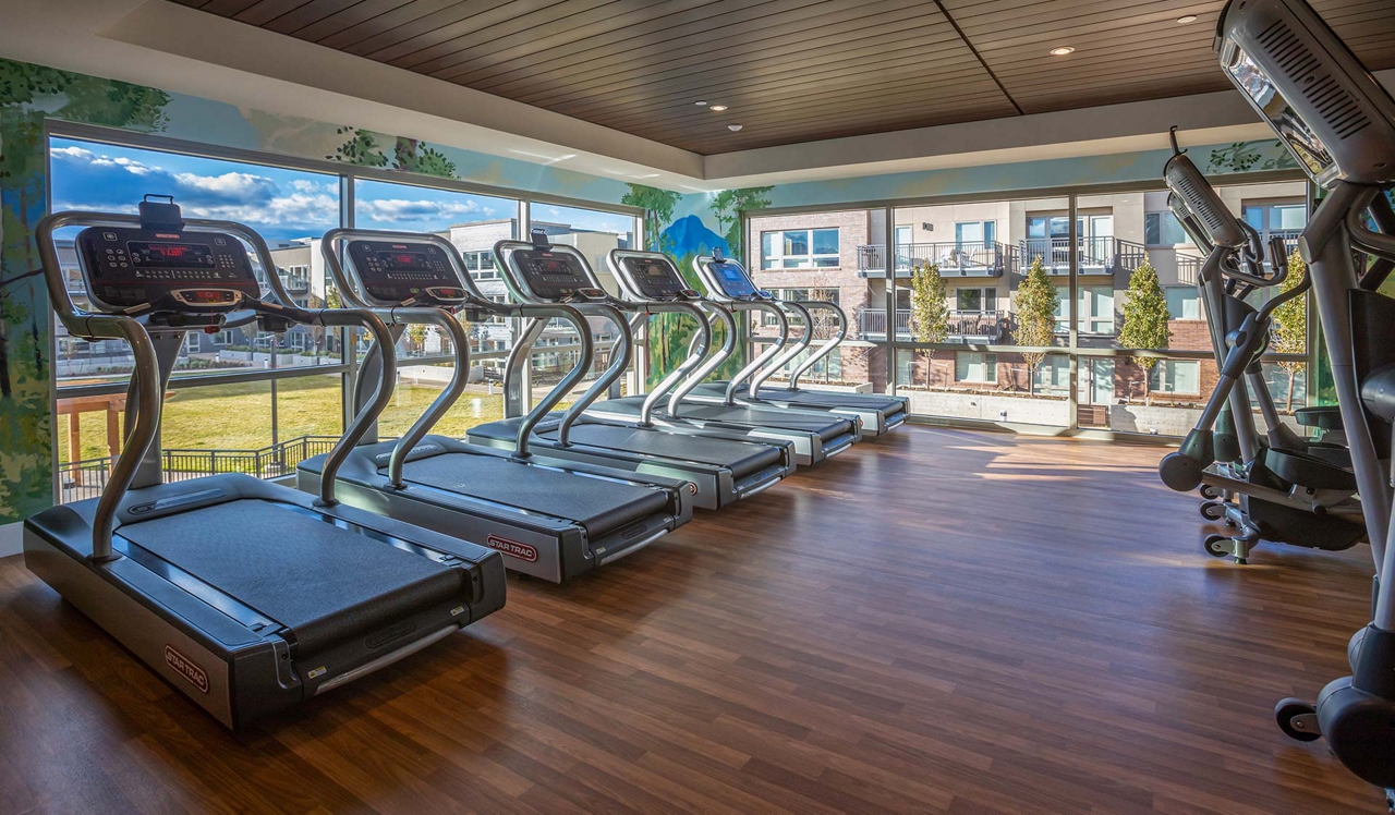 Parc Mosaic - Boulder, CO - fitness center.Two-story fitness center with Peloton bikes and yoga studio.