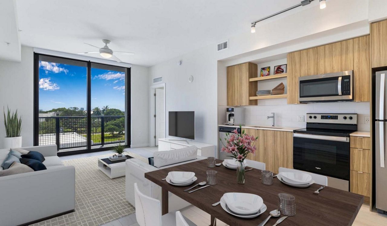 1B10_DistrictAtFlaglerVillageUnit_422_LivingRoom1_CroppedHero